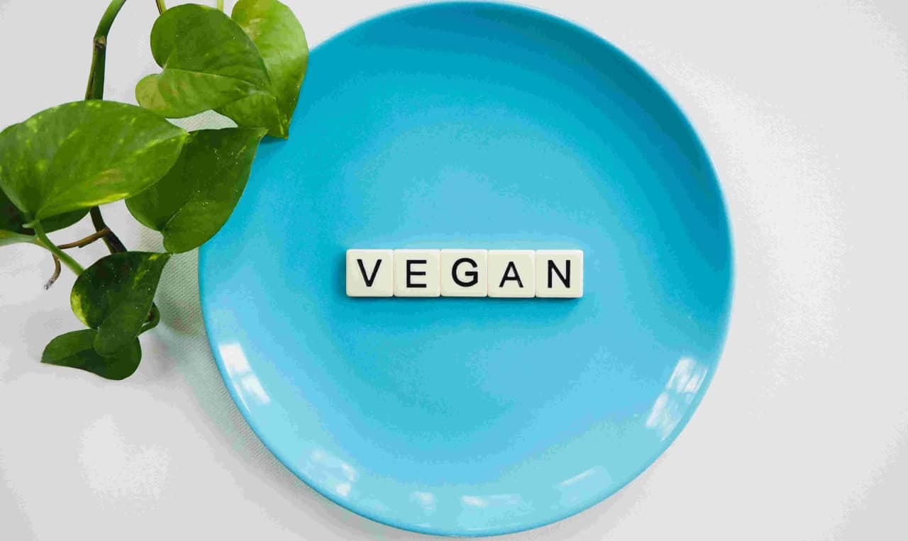 Round blue plate with vegan