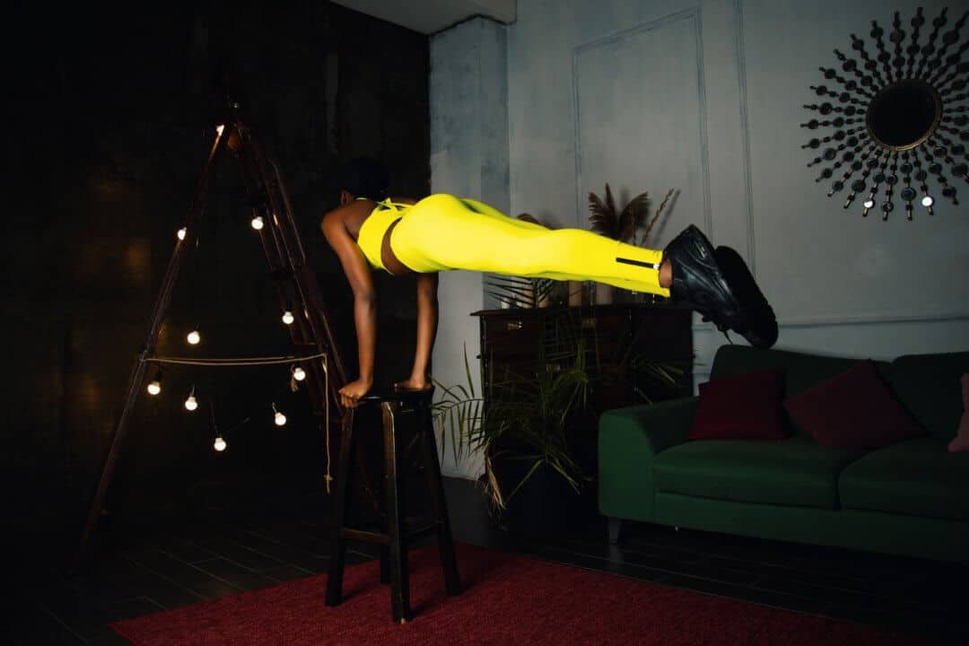 woman-wearing-yellow-pants-doing-yoga-exercise-756565-1080x720-1