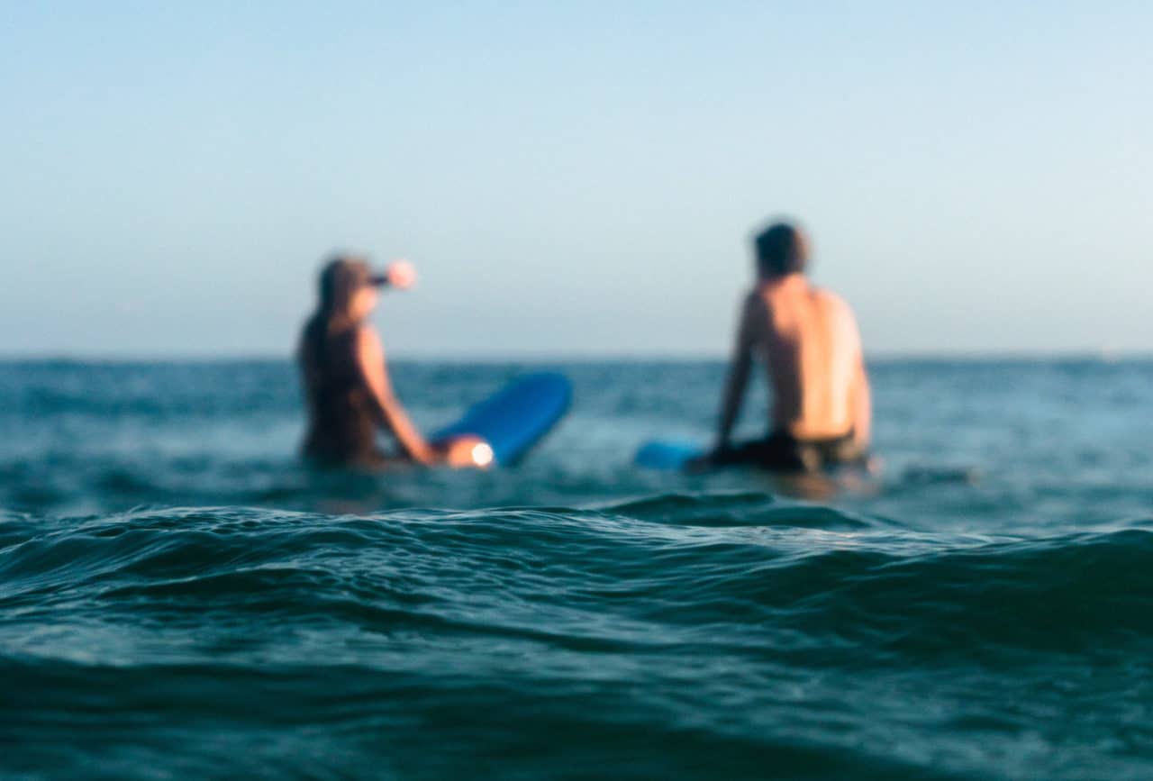 two surfer on ocean