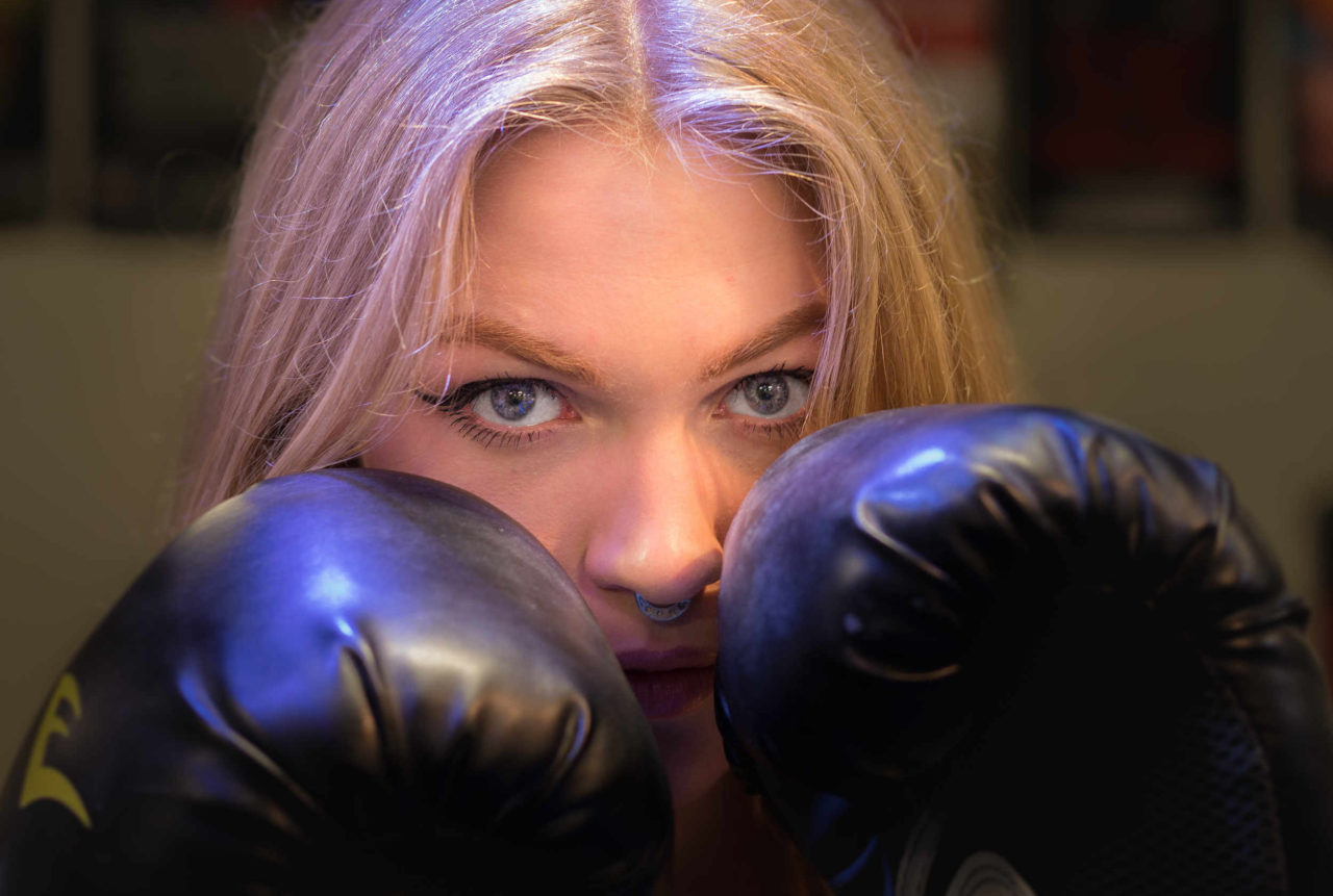 women wearing boxing gloves