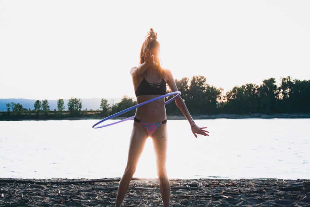 women is hula hooping 